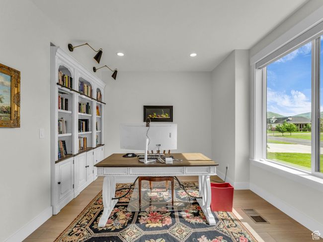 Home office featuring light wood-type flooring, recessed lighting, and baseboards | Image 6