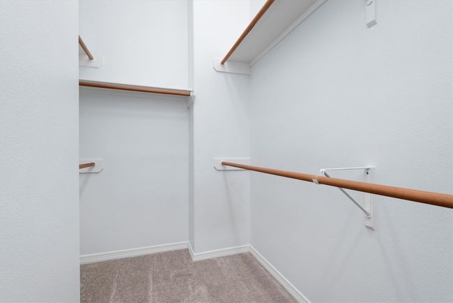 This unit has plenty of storage. This large walk in closet is in the primary bathroom. | Image 23