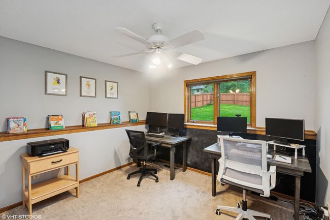 Lower level bedroom #4—versatile space that could easily double as a home office | Image 33