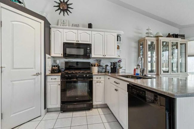 9 Fern Glade Crescent, House other with 4 bedrooms, 3 bathrooms and 4 parking in Sylvan Lake AB | Image 5