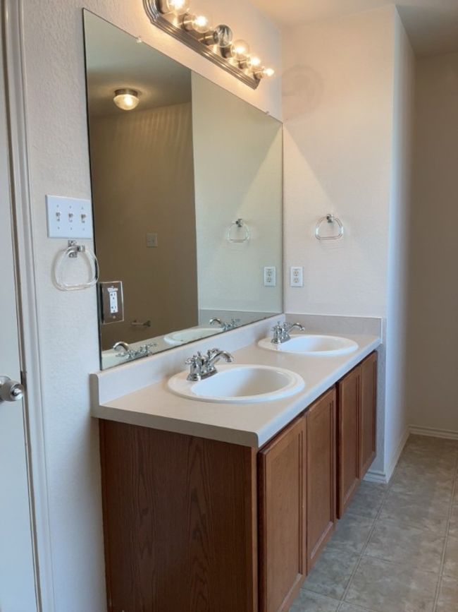 Bathroom featuring double vanity | Image 25