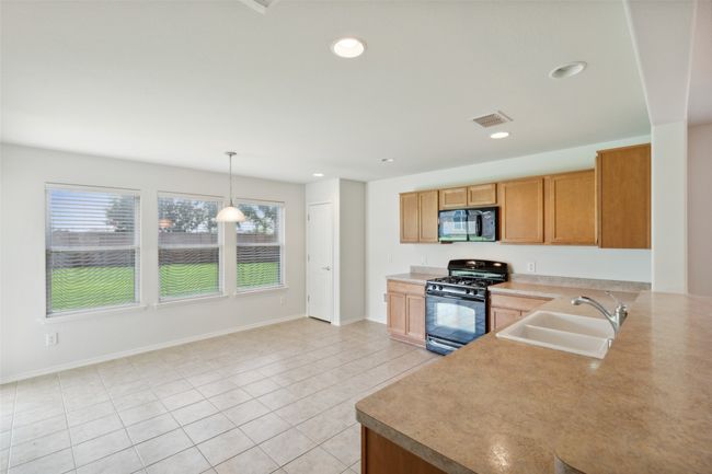 Open concept kitchen and breakfast nook | Image 13