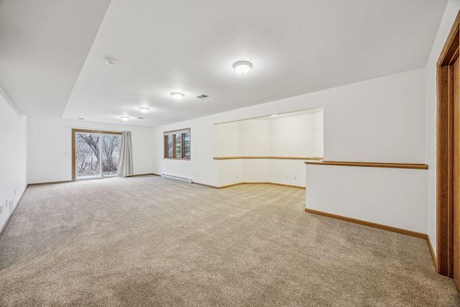 Large recreation room with a walkout. | Image 25