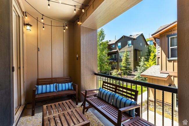 Balcony with an outdoor living space and a residential view | Image 15
