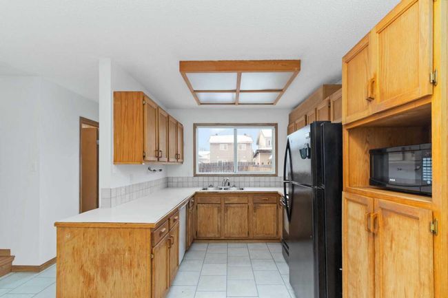 180 Wolverine Drive, Home with 3 bedrooms, 2 bathrooms and 4 parking in Fort Mcmurray AB | Image 9