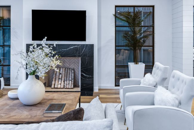 Living room with wood finished floors and baseboards | Image 15