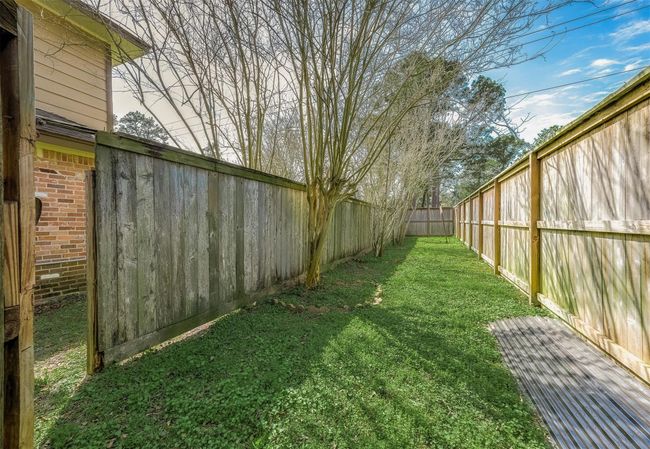 Expansive backyard space, perfect for any needs. | Image 42