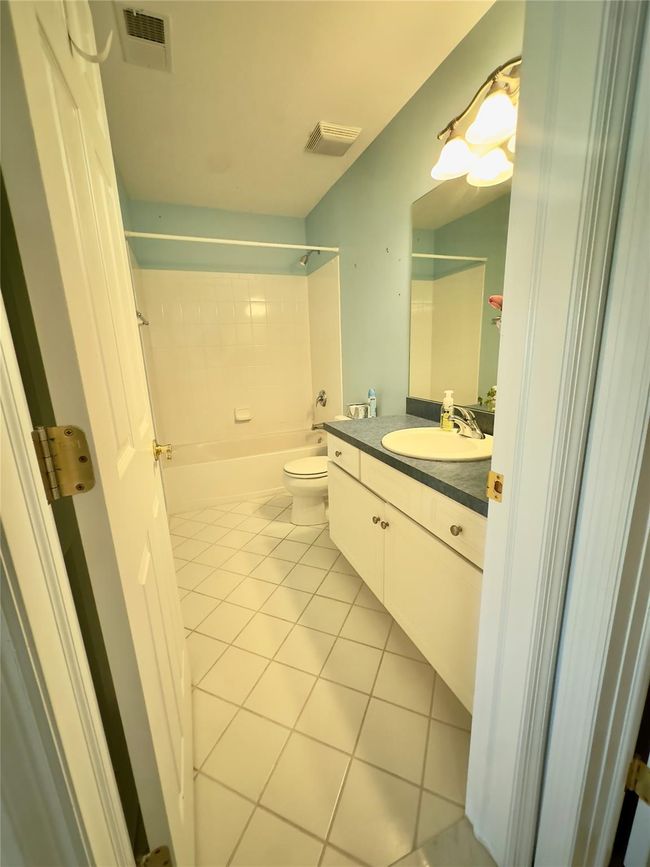 2nd floor Bathroom featuring toilet, vanity, visible vents, and tile patterned floors | Image 14