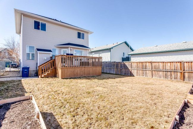 56 Silver Creek Boulevard Nw, Home with 4 bedrooms, 2 bathrooms and 4 parking in Airdrie AB | Image 6
