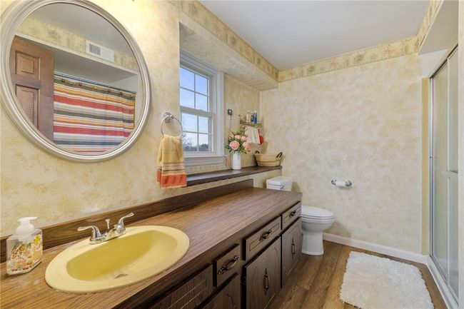 Owners suite has a shower and bath tub | Image 17