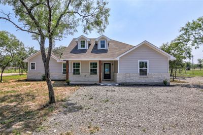 Brand New Construction – Beautifully Designed, Sleek & Modern Single Story Home situated on a sprawling Half-Acre Lot in Cedar Creek’s beautiful Las Alamedas community. | Image 1