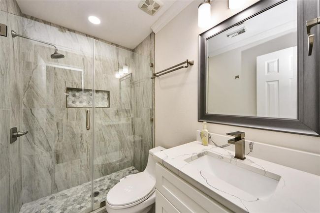 Updated secondary bathroom located on the second floor. | Image 27