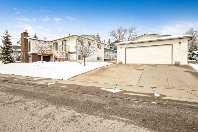 4 Range Green Nw, Home with 4 bedrooms, 2 bathrooms and 4 parking in Calgary AB | Image 25