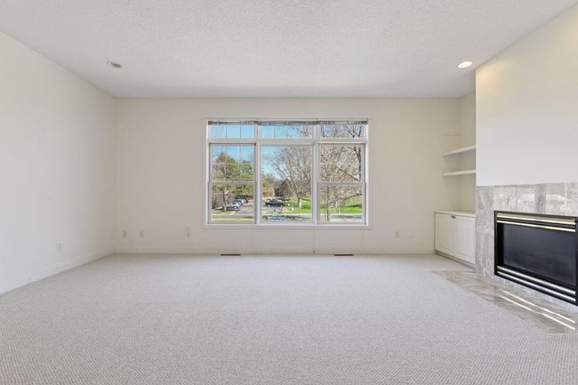 Tons of natural light in east facing living room. | Image 12