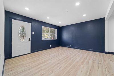 Entryway with wood-type flooring | Image 2