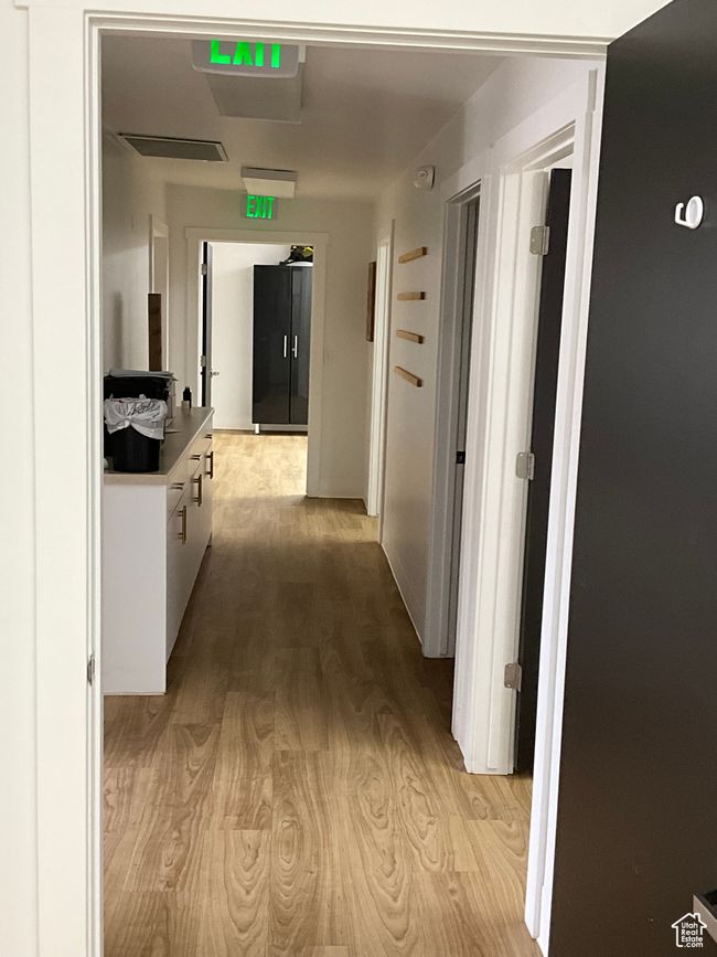 Hall with light wood-style flooring | Image 23