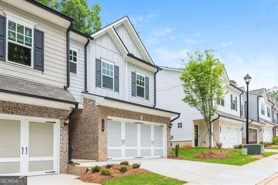 128 Town Walk, Townhouse with 3 bedrooms, 2 bathrooms and null parking in Holly Springs GA | Image 3