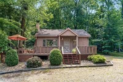 View of front of property featuring a deck | Image 1