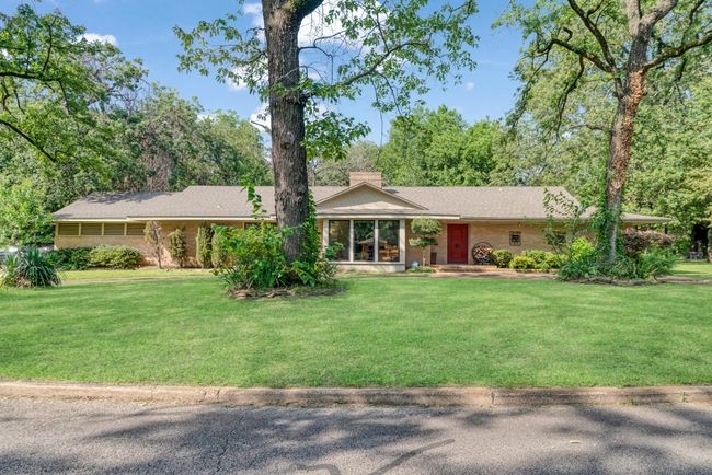 Ranch-style home with a front yard and a chimney | Image 28