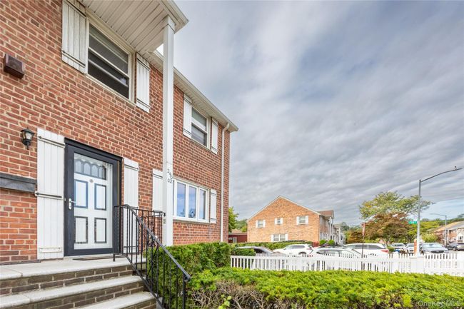 View of property exterior with brick siding | Image 21