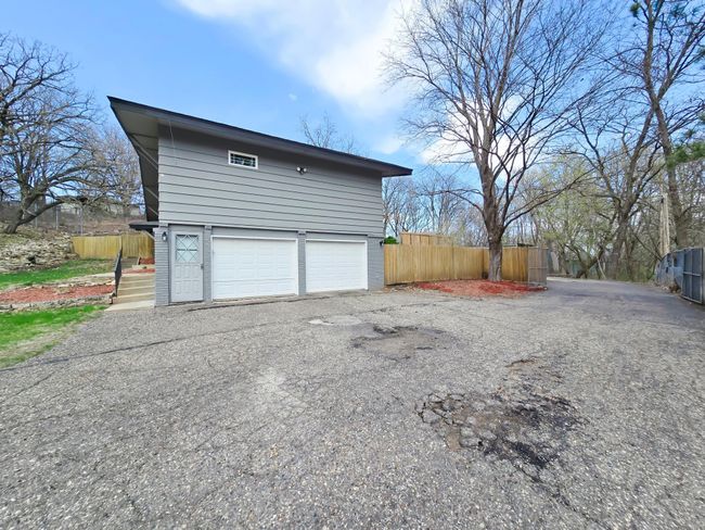 2 car attached garage 1 stall garage in back of property | Image 21