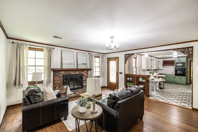 You'll find those original hardwood floors in this space as well. | Image 34