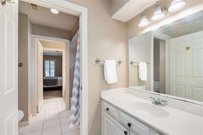 A convenient Jack-and-Jill layout connects two of the bedrooms, offering shared access while maintaining privacy—an ideal setup for siblings or guests. | Image 28