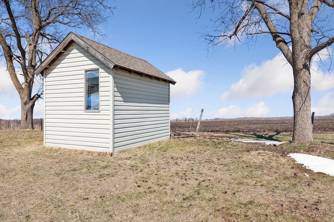A convenient storage shed provides extra space for all your lake gear, outdoor equipment, and seasonal items, keeping everything organized and easily accessible. | Image 25