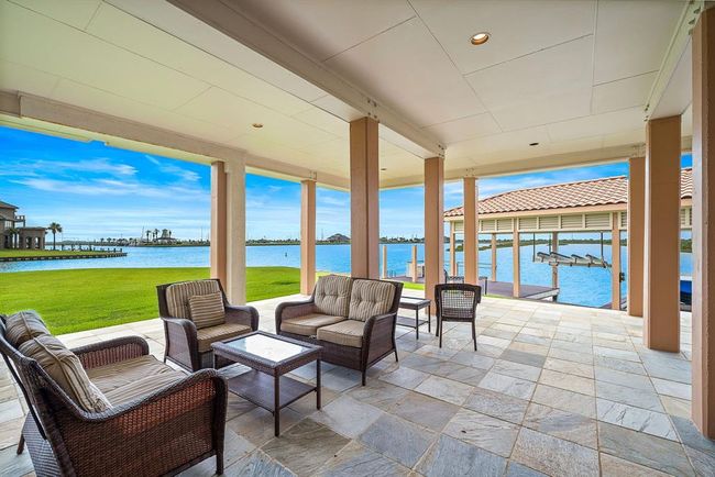 The ground-level dockside living offers effortless access to the water, with spacious, open areas designed for relaxation and enjoying the scenic waterfront surroundings | Image 38