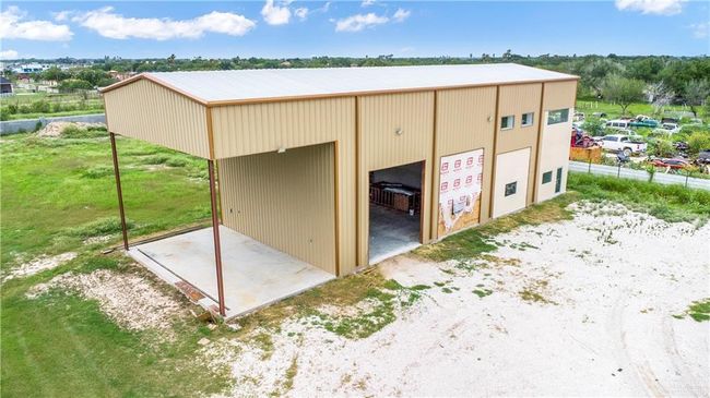 Garage featuring a garage | Image 24