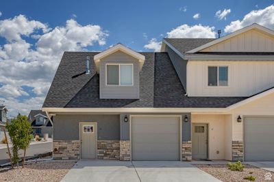 View of front of house featuring a garage | Image 2