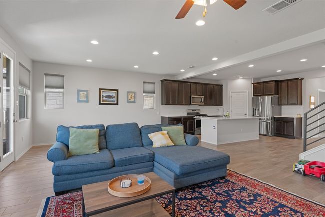 Brightened by recessed light fixtures and tall main level ceilings | Image 4