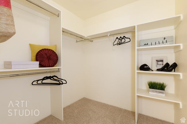 Walk in closet featuring carpet flooring | Image 29