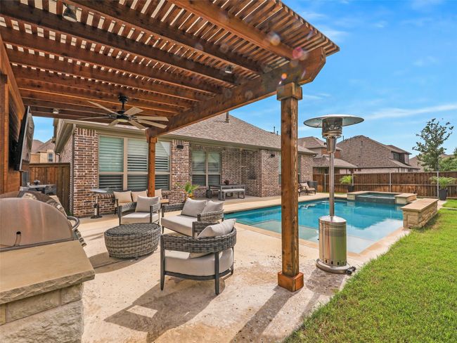 Covered patio and kitchen | Image 34