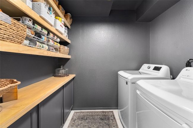 Newly remodeled pantry/laundry room with built in storage | Image 23
