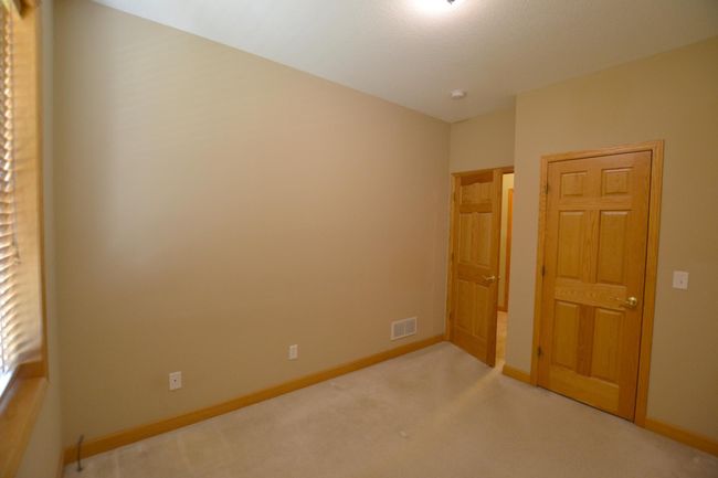 2nd main floor BR, 10x11. All bedrooms have walk in closets! | Image 14