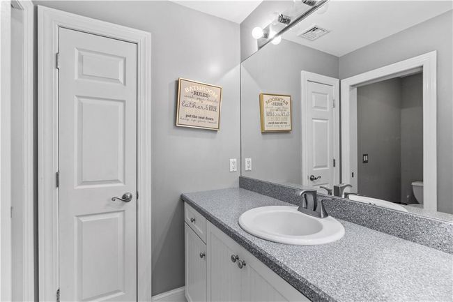 Bathroom with vanity and toilet | Image 26