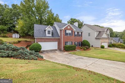 3990 Riversong Drive, House other with 3 bedrooms, 2 bathrooms and null parking in Suwanee GA | Image 2