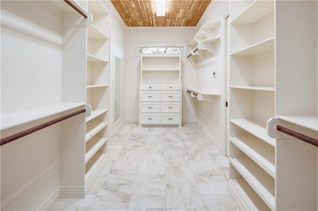 Walk in closet with marble finish floor | Image 20