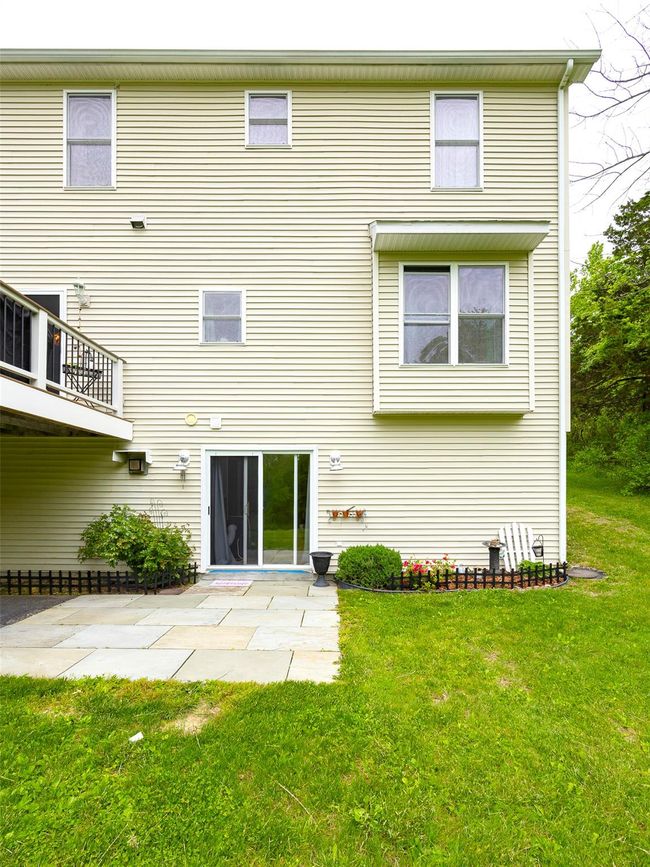 Back of property with a yard and a patio | Image 30