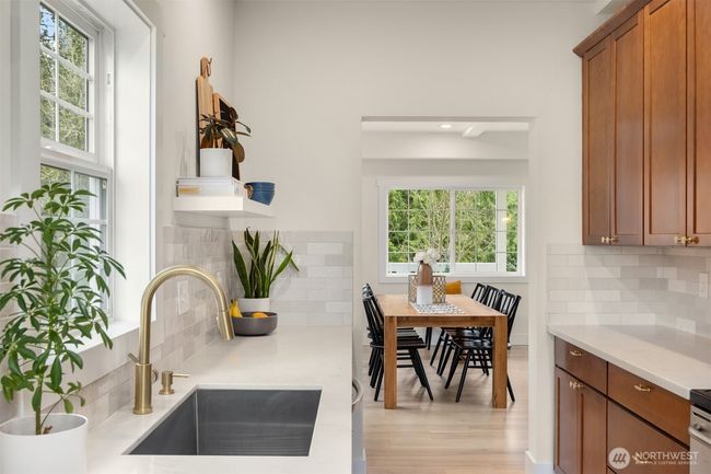 Recently remodeled kitchen with tons of cabinet storage and open shelving. | Image 11
