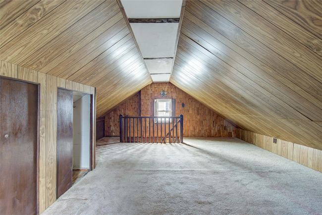 Additional living space with wooden walls, carpet, vaulted ceiling, and wooden ceiling | Image 36