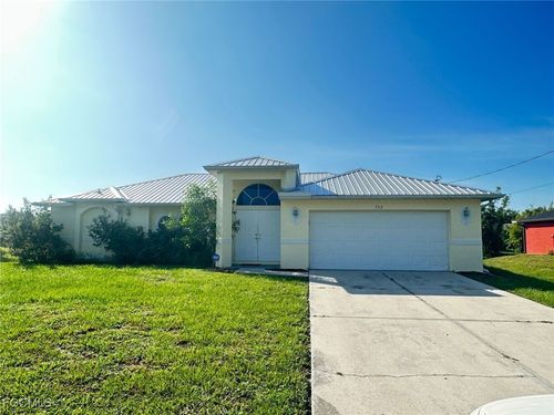 522 Denbigshire St, LEHIGH ACRES, FL, 33974-5604 | Card Image