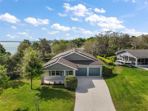 137 E Palmetto Ave, HOWEY IN THE HILLS, FL, 34737-3323 | Card Image