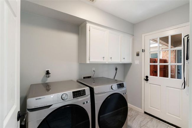 Utility Room has room for freezer or second refrigerator. | Image 16