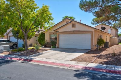 8933 Iron Hitch Avenue, House other with 4 bedrooms, 2 bathrooms and null parking in Las Vegas NV | Image 1