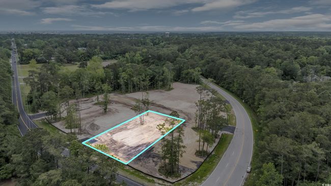 Drone / aerial view featuring a wooded view | Image 8