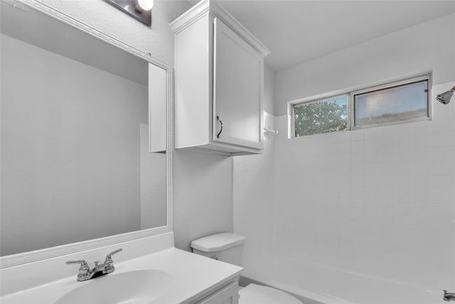 Full bath with vanity and washtub / shower combination | Image 26