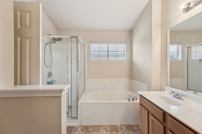 Spa-Like Luxury – Soak in the garden tub or refresh in the walk-in shower—your choice. | Image 8