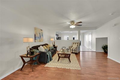 Upon entering you will be greeted by a bright and airy floorplan, beautifully finished hardwood flooring and fresh interior paint! | Image 3